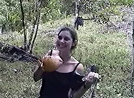 organic farm volunteer enjoying a coconut